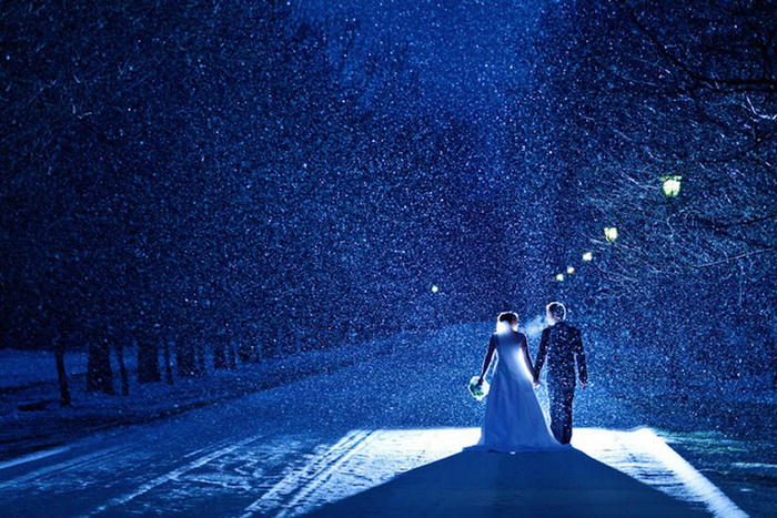 Свадебные фотографии под дождем и снегом. Фотография Jon Mark Photography