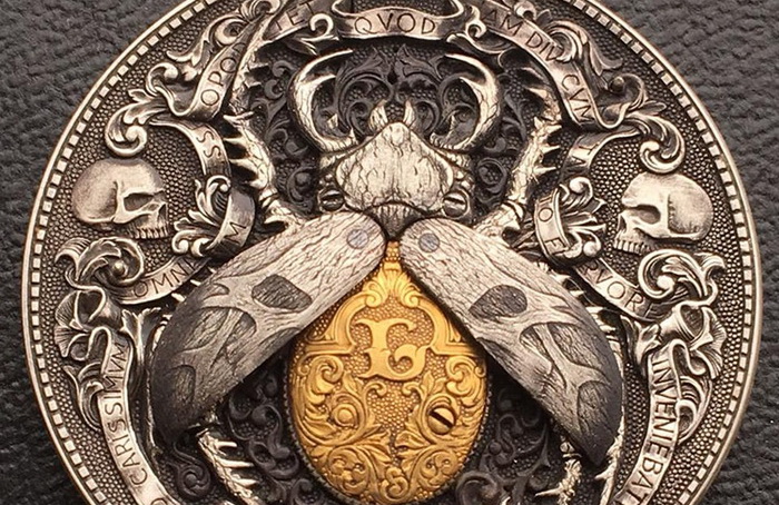 *Золотой жук* - монета с секретом от Романа Бутина.