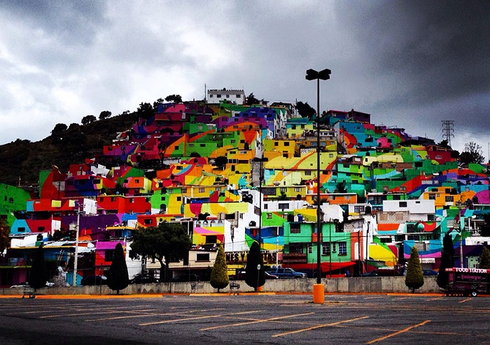 Уличные художники Germen Crew раскрасили фасады зданий города Пальмитас.