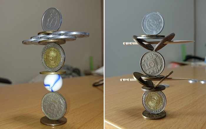 Японец создает из монет конструкции, которые бросают вызов всем законам гравитации. | Фото: odditycentral.com.