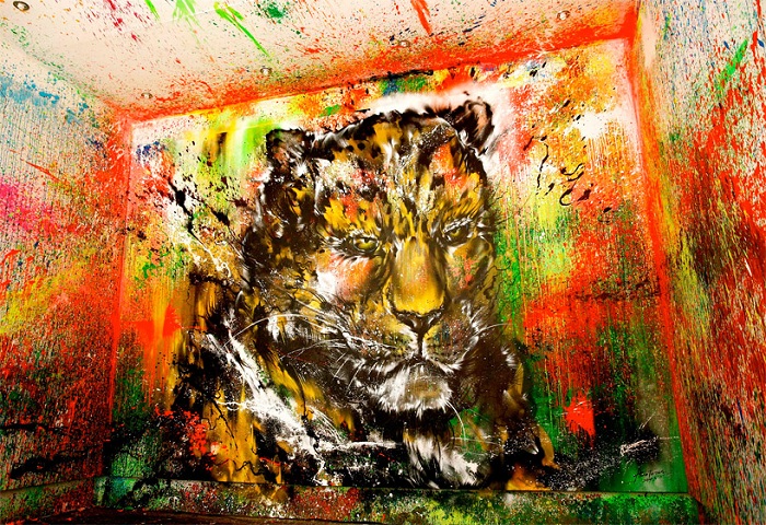 Портрет леопарда, нарисованный брызгами.