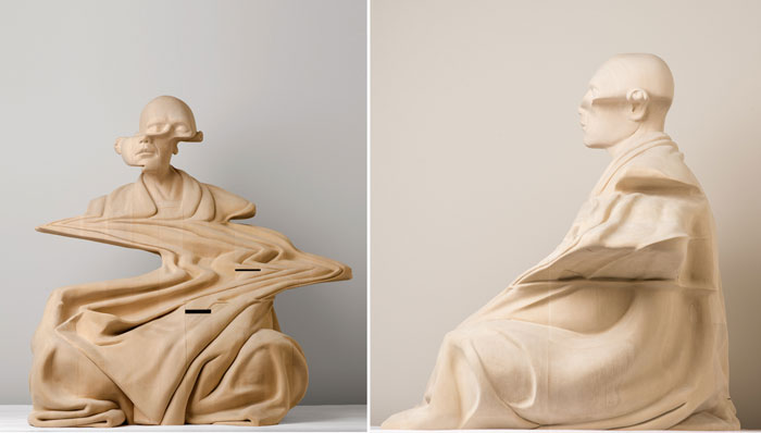 Скульптура, изображающая медитирующего монаха.