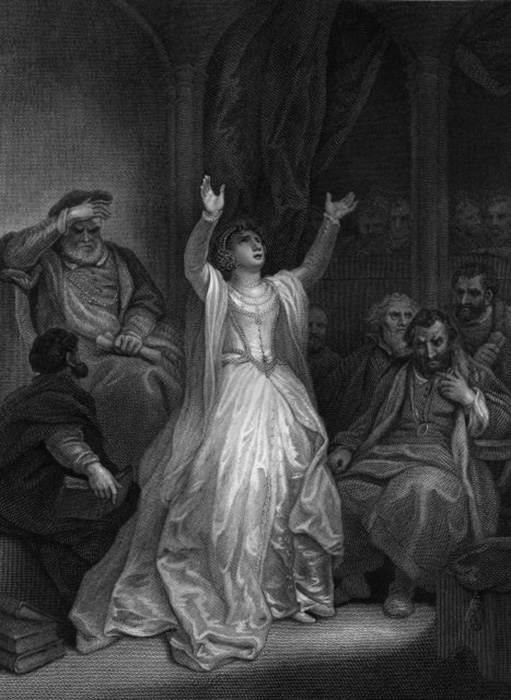 Анна Болейн в отчаянии поднимает руки, будучи приговорённой к смертной казни за государственную измену в лондонском Тауэре.