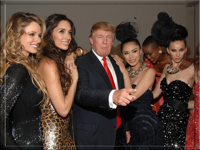 Дональд Трамп в окружении красоток моделей.