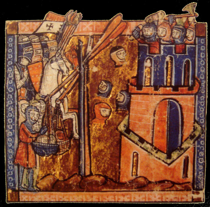 Крестоносцы забрасывают за стены Никеи головы убитых врагов, миниатюра, конец XIII века. \ Фото: engagingpeace.com.