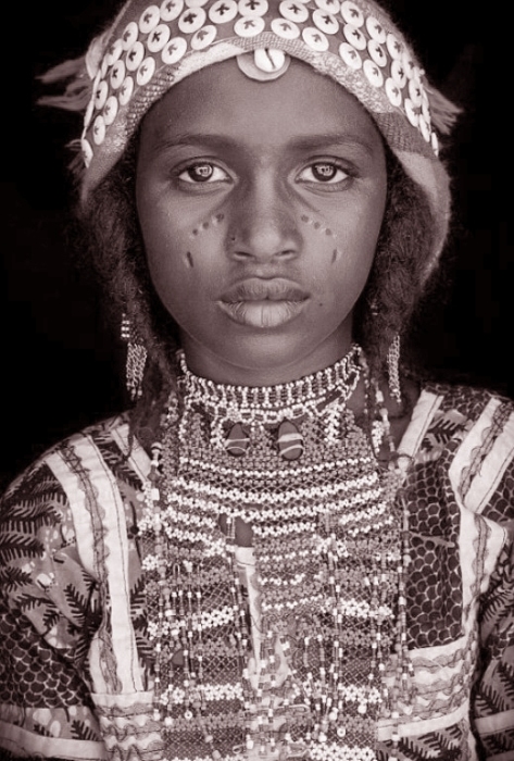 Племенная жительница Западной Африки. Автор: John Kenny.