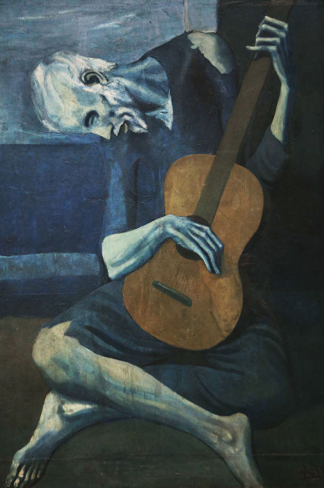 «Старый гитарист» — картина Пабло Пикассо. \ Фото: pinterest.at.