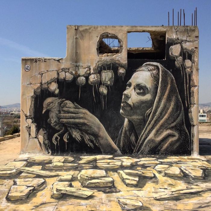 Впечатляющий стрит-арт, нарисованный на одном из зданий в Афинах, Греция (2016 год).