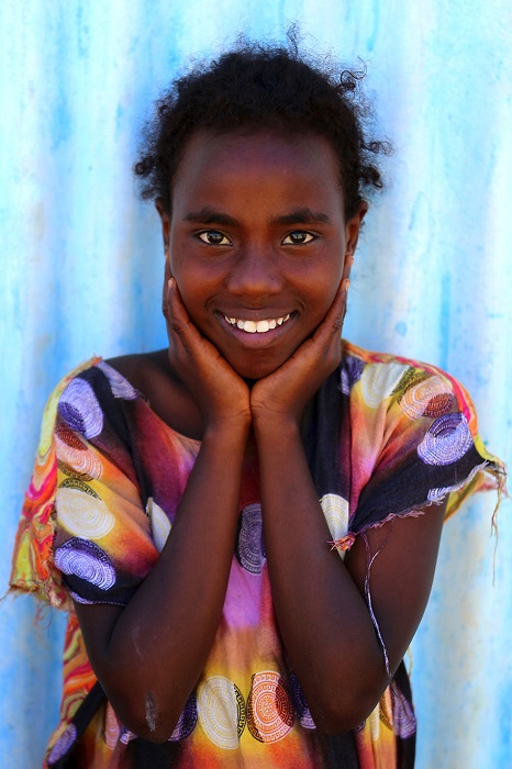 Девушка из государства в Восточной Африке.