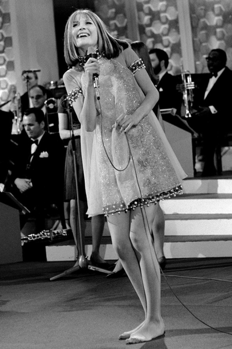 Британская певица, победительница конкурса песни Евровидение 1967 года.