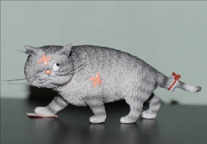 Сувенирные статуэтки из серии *Кошки*. Автор: Альберт Дюбуа.