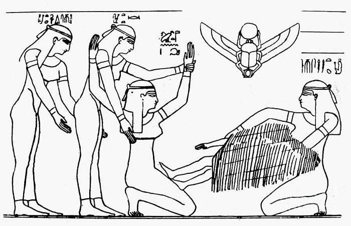 Рисунок с древнеегипетского барельефа, изображающего процесс родов.