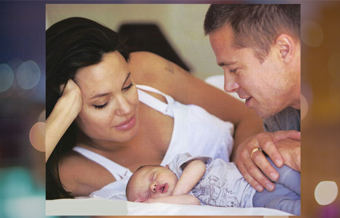 Анджелина Джоли и Брэд Питт с малышкой Шайло.