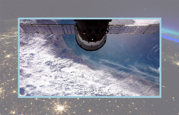 Фото: облака над Хьюстоном, космонавт Роскосмоса Сергей Рыжиков.