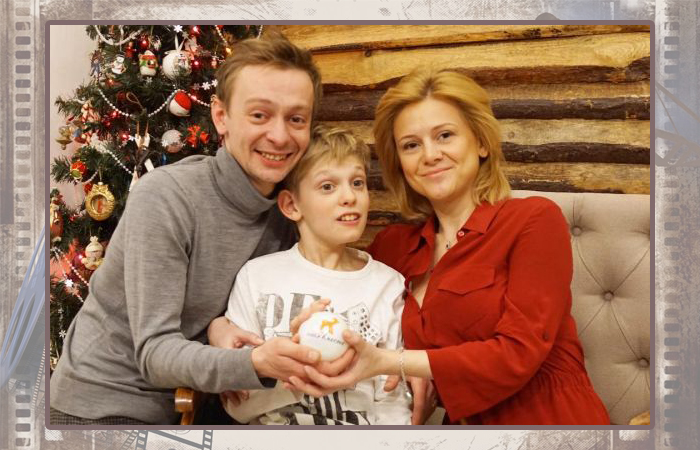 Евгений Кулаков и Ольга Бужор с сыном.