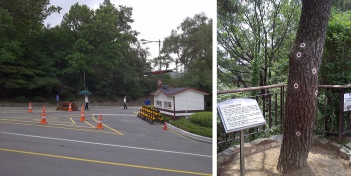 Контрольно-пропускной пункт Segeomjeong-Jahamun, белое строение – пулеметный бункер. «Голубой дом» – на заднем плане. Справа – сосна возле КПП со следами пуль