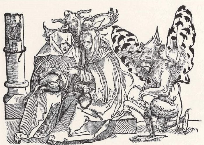 Демон подписывает договор с монахинями. Средневековый рисунок / Источник: yaustal.com